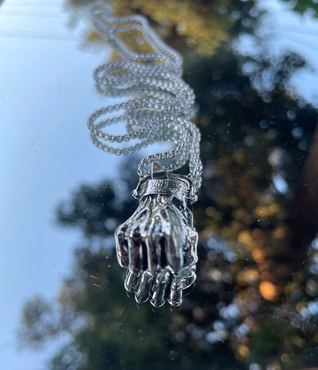 Fist Full Of Power Necklace